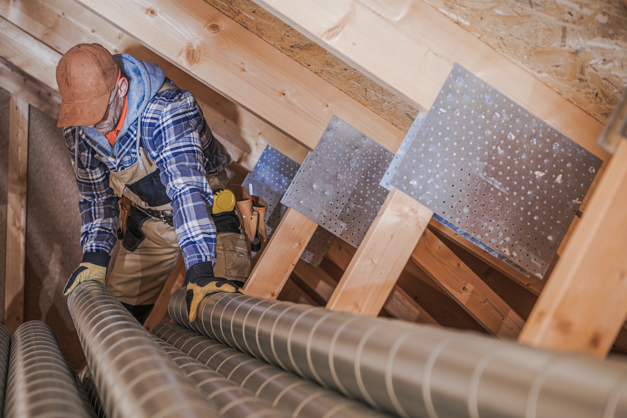 HVAC Technician Assembling Air Vent In House.