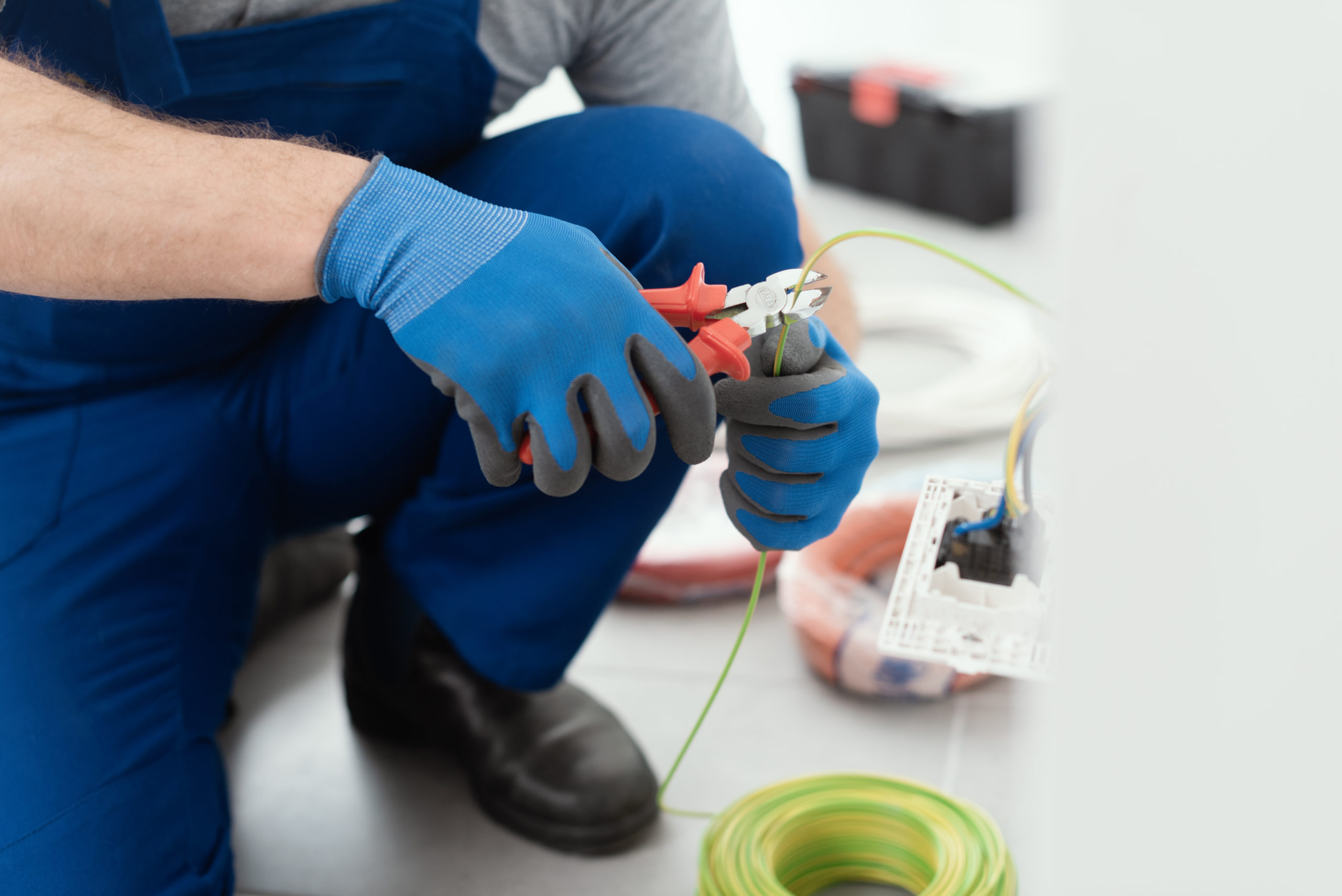 professional electrician working on the electrical       utc scaled